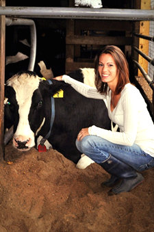 Laura with a dairy cow